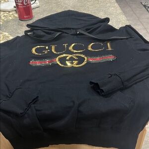 Gucci Black Hoodie with Gold Logo and Red-Green Stripe Embroidery